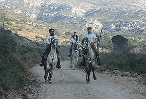 Riding a horse through the Montgrí Mountains, near Santa Caterina