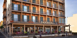  Emporium is a family-run hotel in the historic center of Castelló d’Empúries, in Catalonia’s Alt Empordà region. It offers a gourmet restaurant with an award-winning wine cellar.